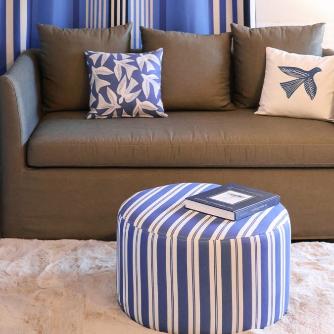 Comfortable blue and white striped pouffe top-of-the-range furniture