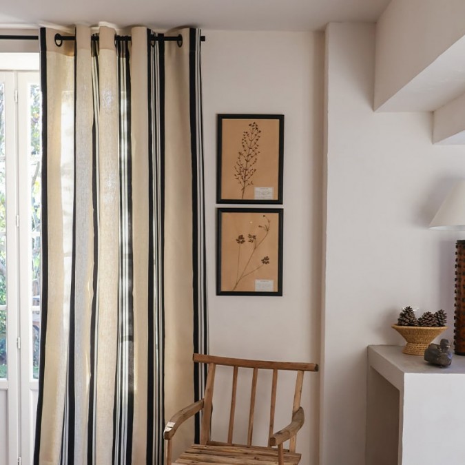 Fabric by the metre for decorating a linen canvas with black stripes in a refined chic style